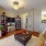 a living room with a couch and a TV
